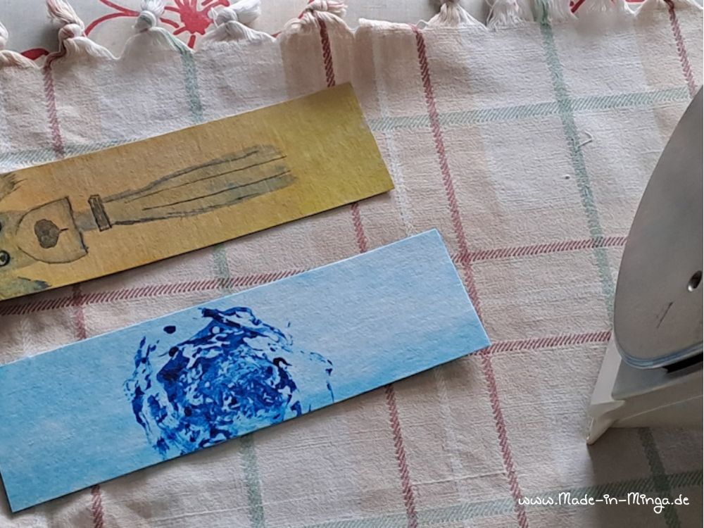 Lesezeichen werden gebügelt